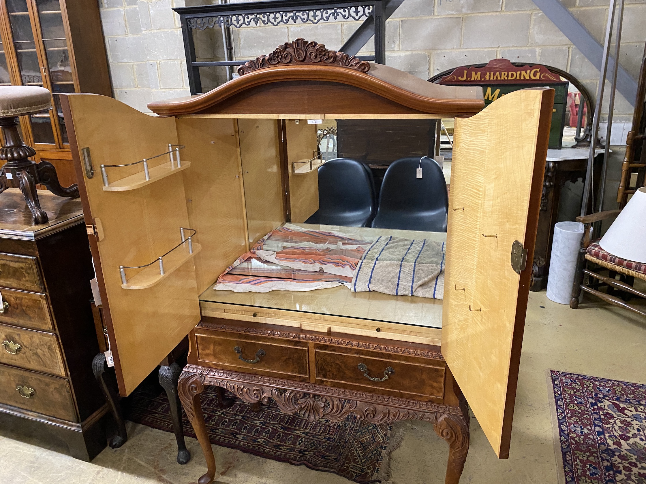 A Queen Anne style walnut cocktail cabinet, width 94cm, depth 52cm, height 160cm